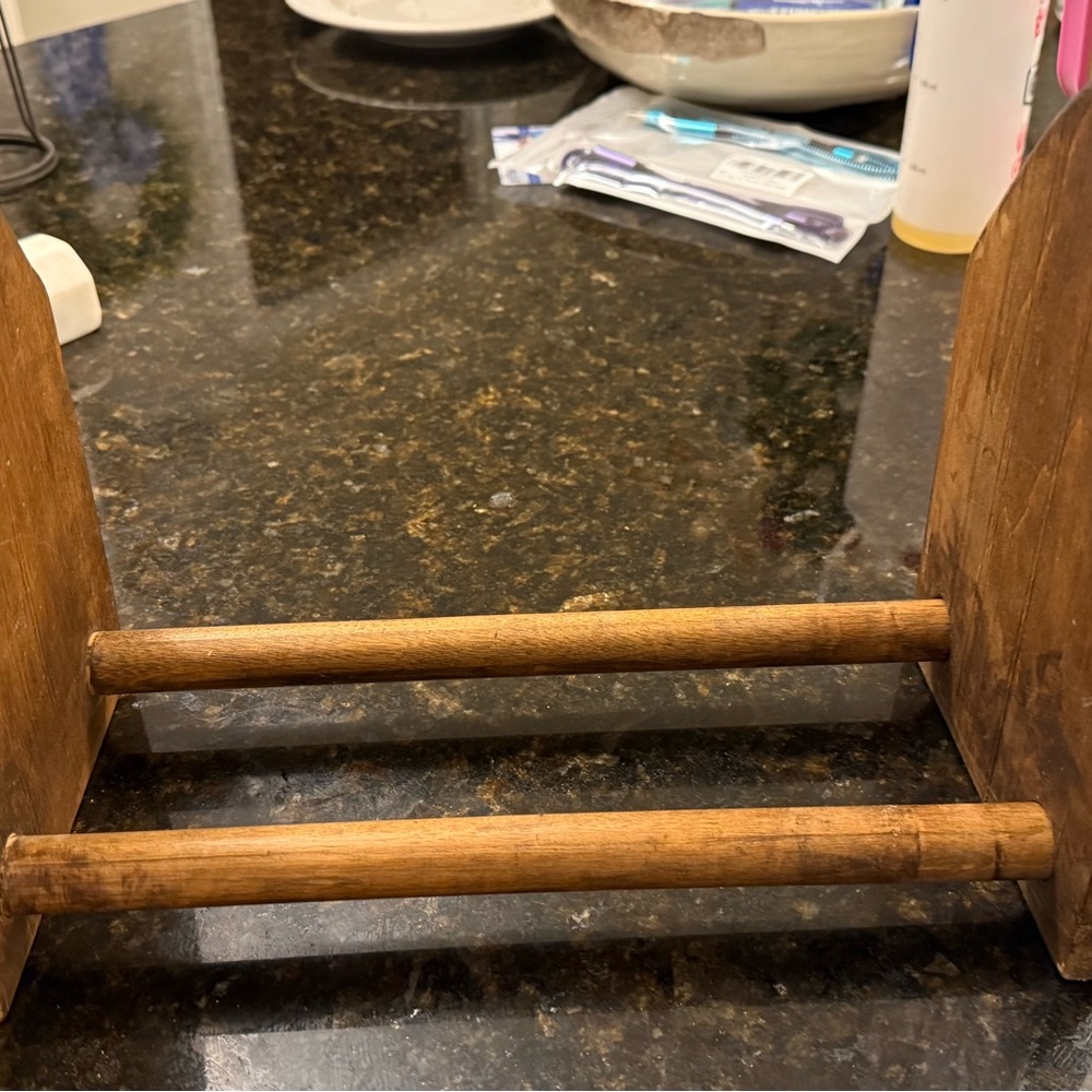 Table top sliding book rack.